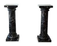 A Pair of Black Marble Pedestals