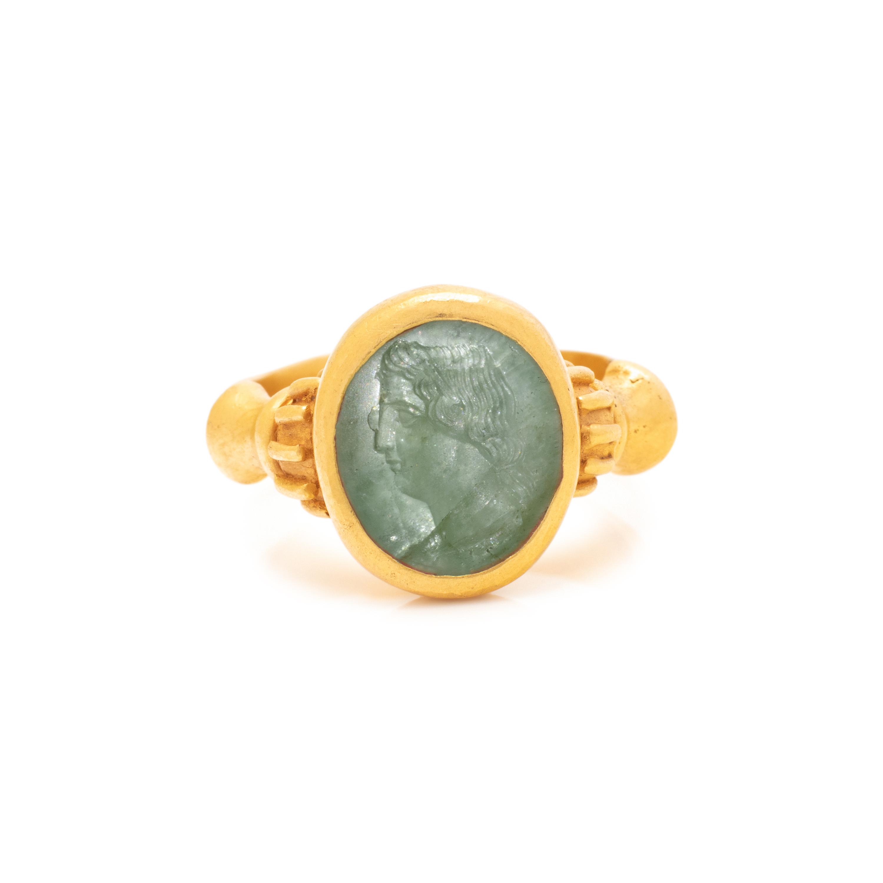 ANCIENT, HIGH KARAT YELLOW GOLD AND AQUAMARINE INTAGLIO RING