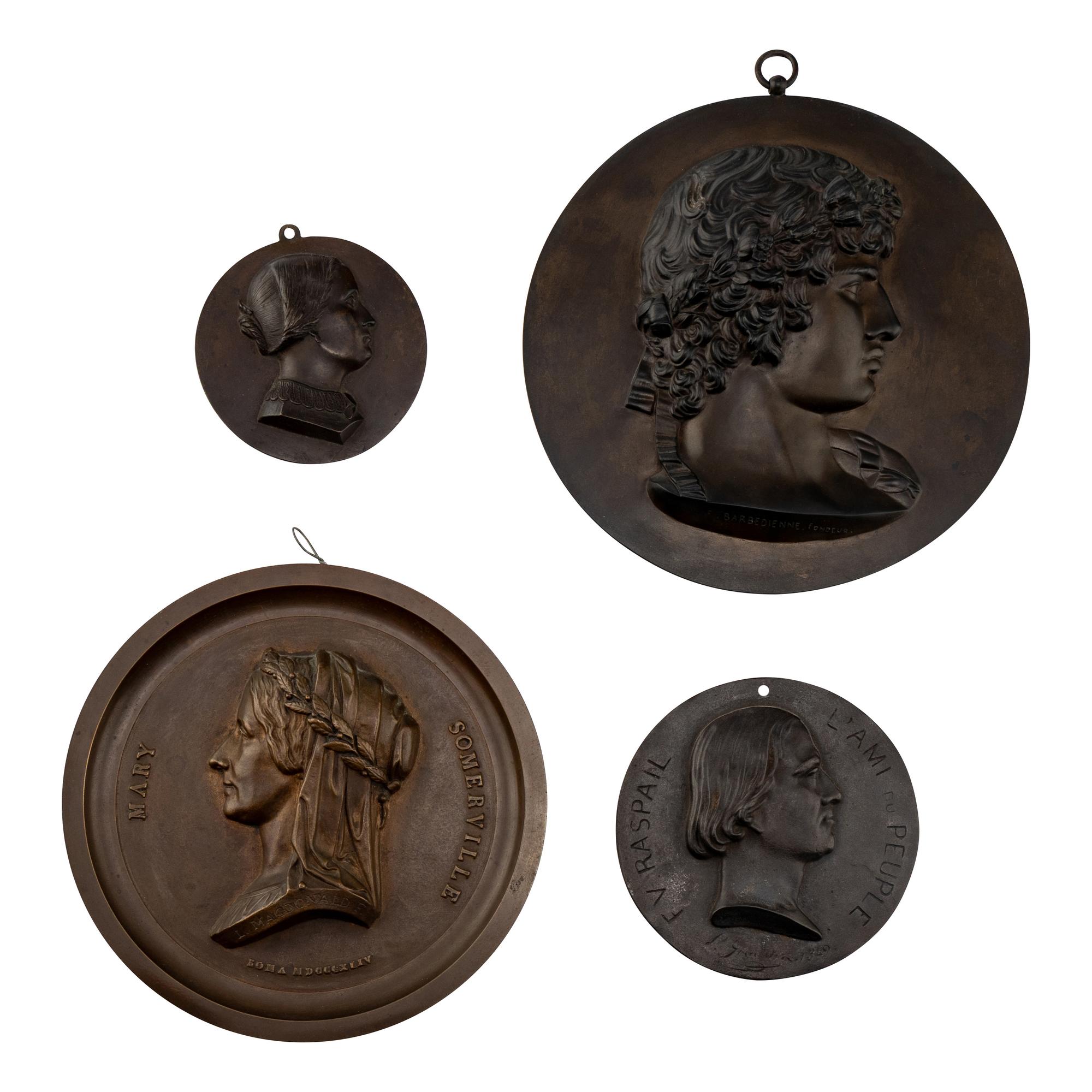 Four Bronze Profile Plaques
