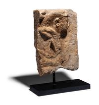 An Egyptian Limestone Fragment with a Dignitary