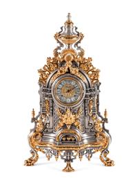 An Italian Gilt and Silvered Metal Mantel Clock