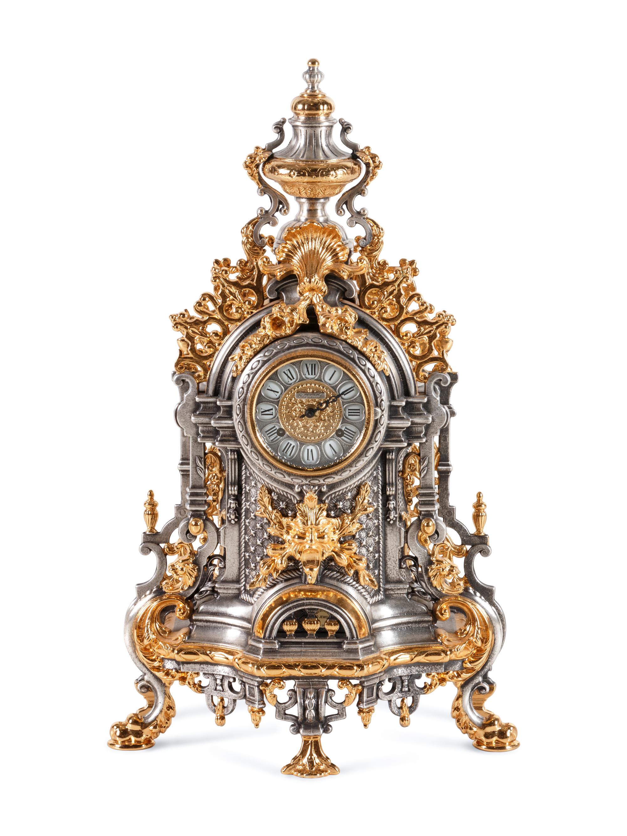 An Italian Gilt and Silvered Metal Mantel Clock
