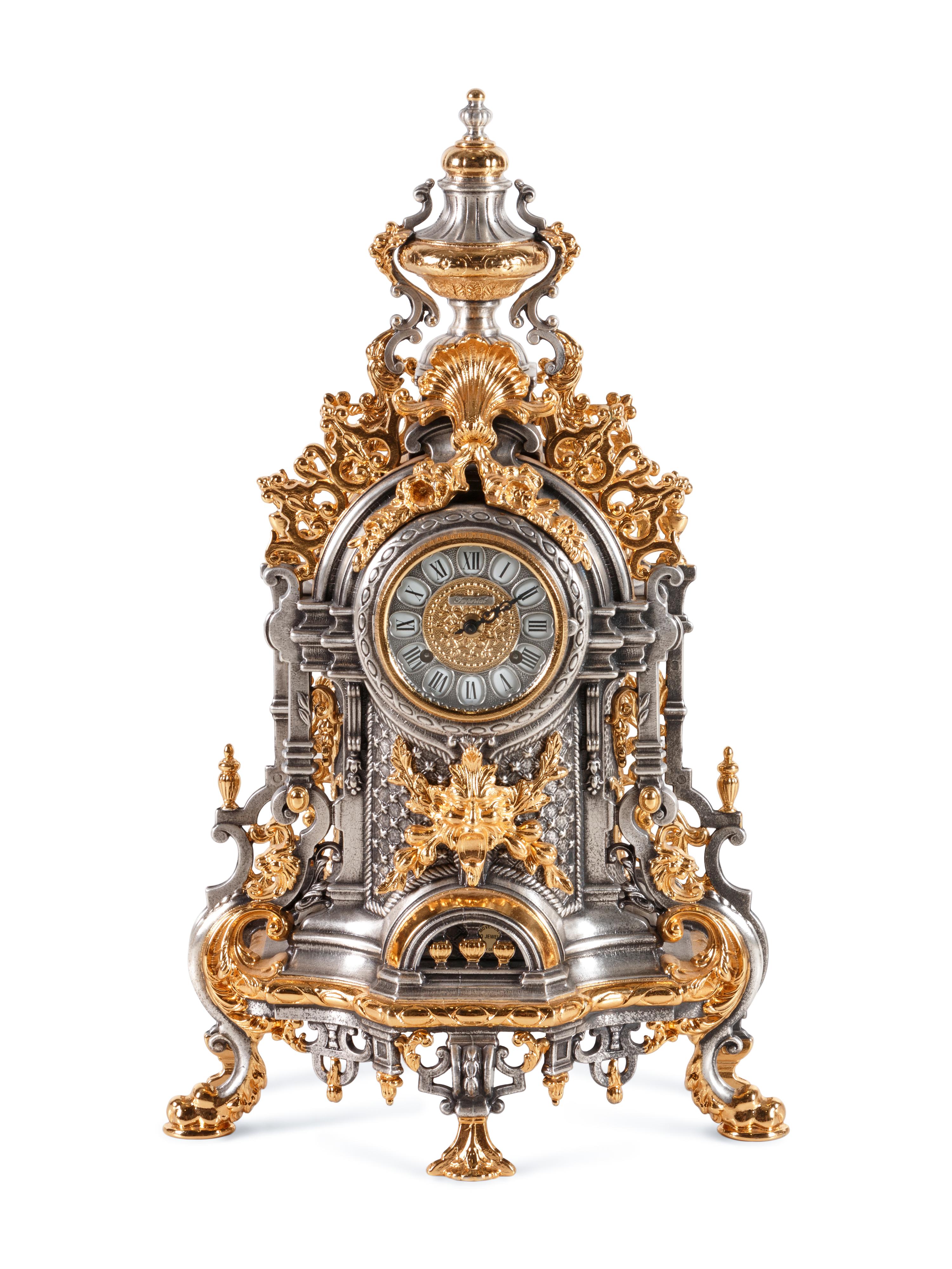 An Italian Gilt and Silvered Metal Mantel Clock