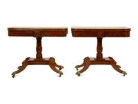 A Pair of Regency Flame Mahogany Flip-Top Games Tables — 19TH CENTURY