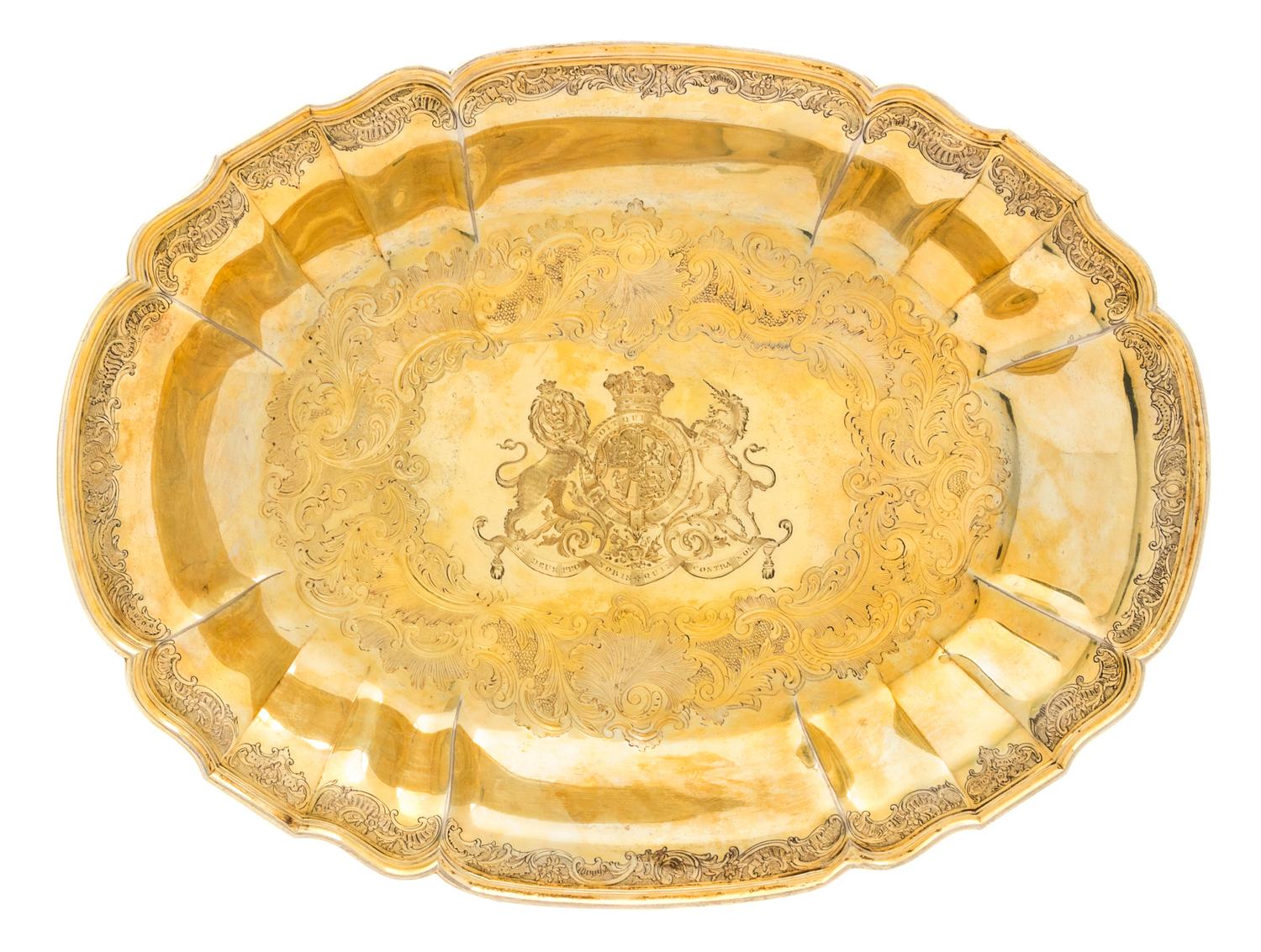 A Belgian Silver-Gilt Serving Dish of English Ducal Interest, Maker's Mark GV, Liege, 18th Century, of oval form, the undulating rim ch
