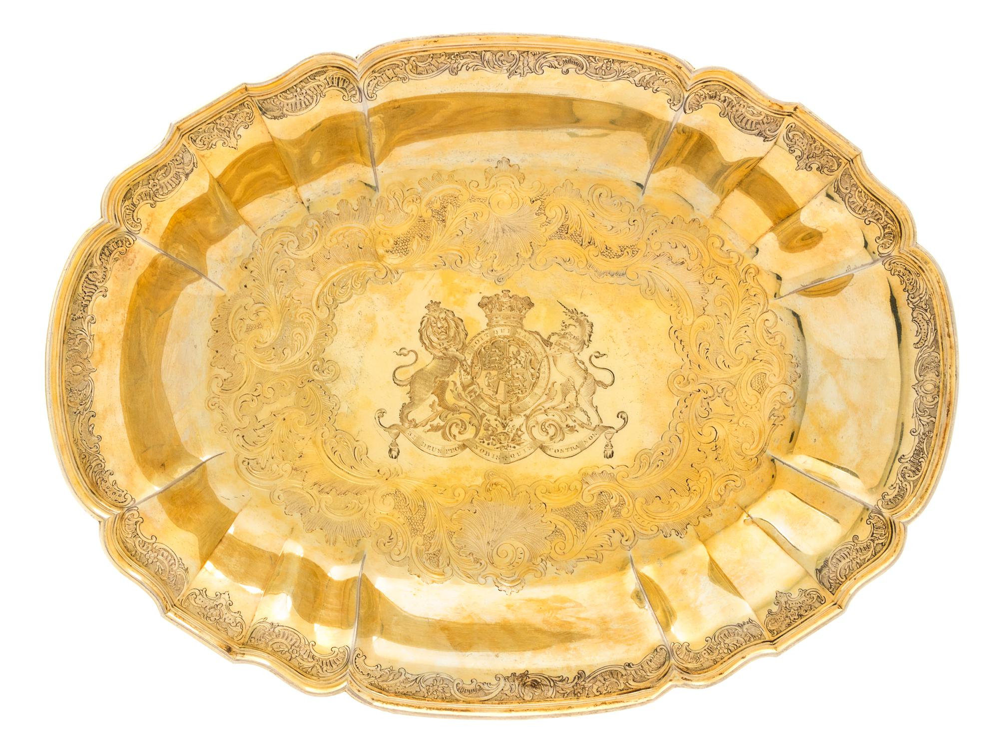 A Belgian Silver-Gilt Serving Dish of English Ducal Interest, Maker's Mark GV, Liege, 18th Century, of oval form, the undulating rim ch