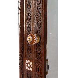 A Syrian Mother-of-Pearl Inlaid and Carved Walnut Vitrine Cabinet