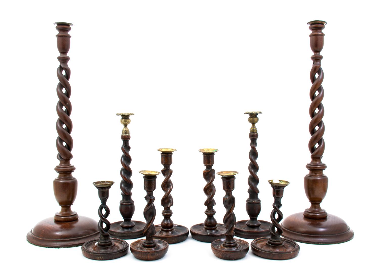 Five Pairs of English Turned and Carved Wood Candlesticks, Height of tallest 24 1/4 inches.
