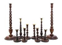 Five Pairs of English Turned and Carved Wood Candlesticks, Height of tallest 24 1/4 inches.