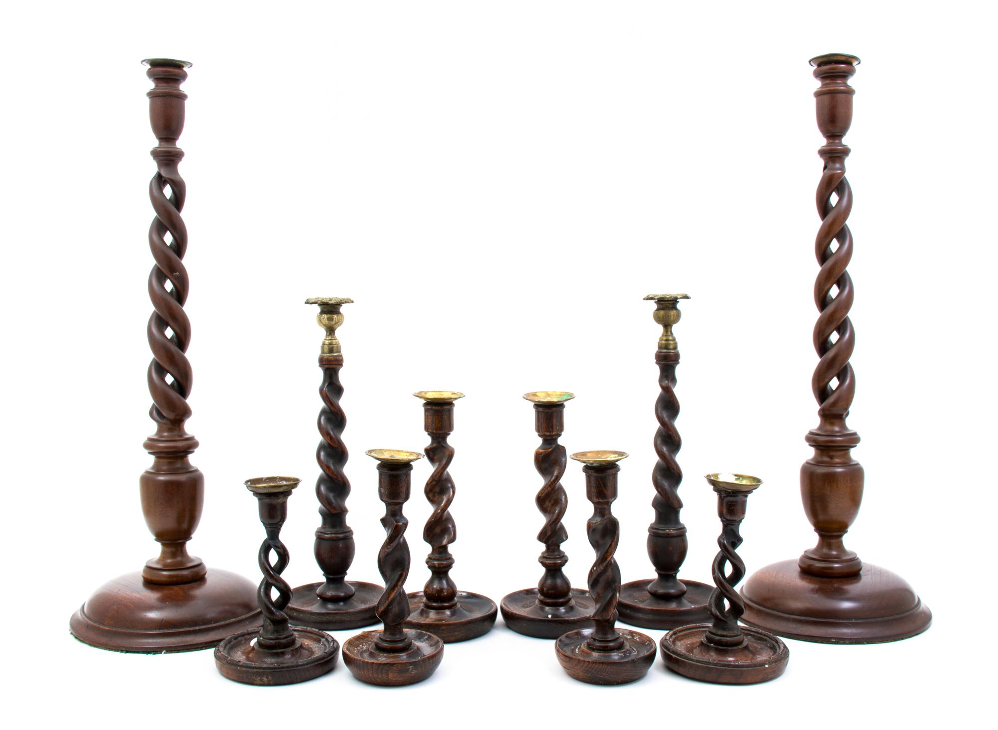Five Pairs of English Turned and Carved Wood Candlesticks, Height of tallest 24 1/4 inches.