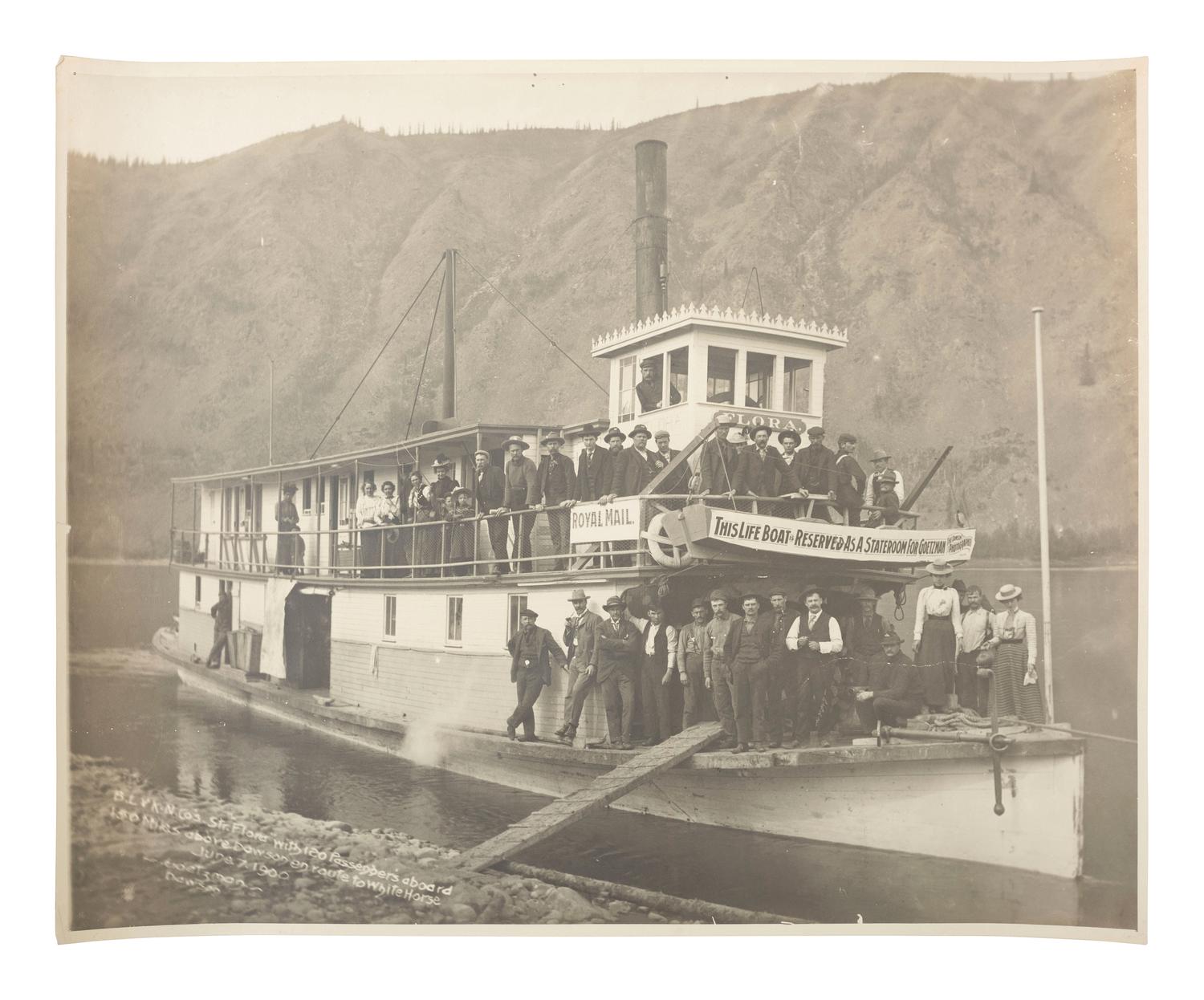 Klondike Gold Rush GOETZMAN, Henry J. (b. 1864), Mammoth Plate of the Steamer "Flora" with 120 Passengers aboard 150 Miles above Dawson en route to White Horse . Dawson, Yukon Territory: 1900.