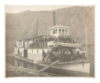 Klondike Gold Rush GOETZMAN, Henry J. (b. 1864), Mammoth Plate of the Steamer "Flora" with 120 Passengers aboard 150 Miles above Dawson en route to White Horse . Dawson, Yukon Territory: 1900.