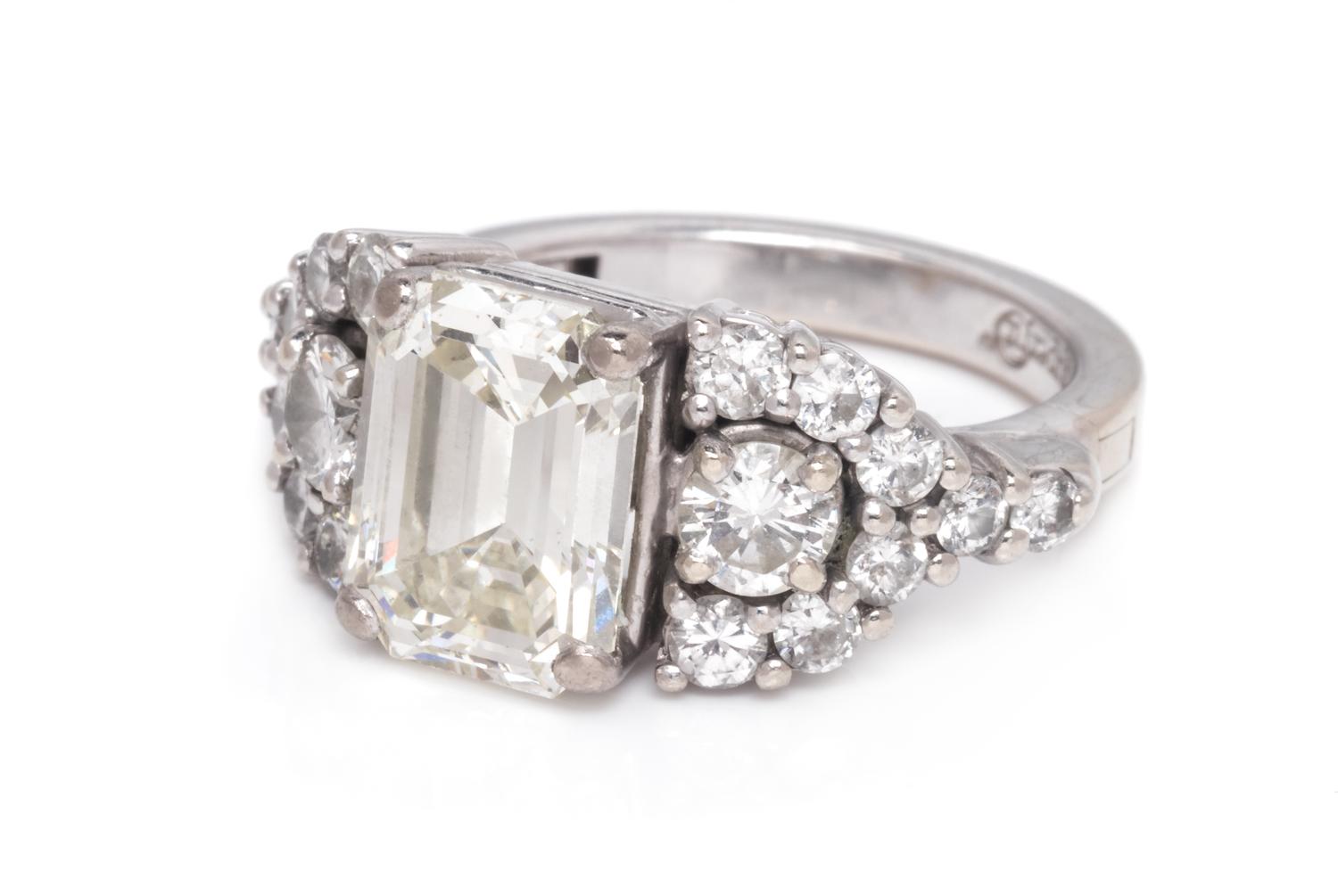 A 14 Karat White Gold and Diamond Ring,