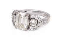 A 14 Karat White Gold and Diamond Ring,