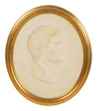 A Pair of Roman Style Composition Relief Plaques in Giltwood Frames