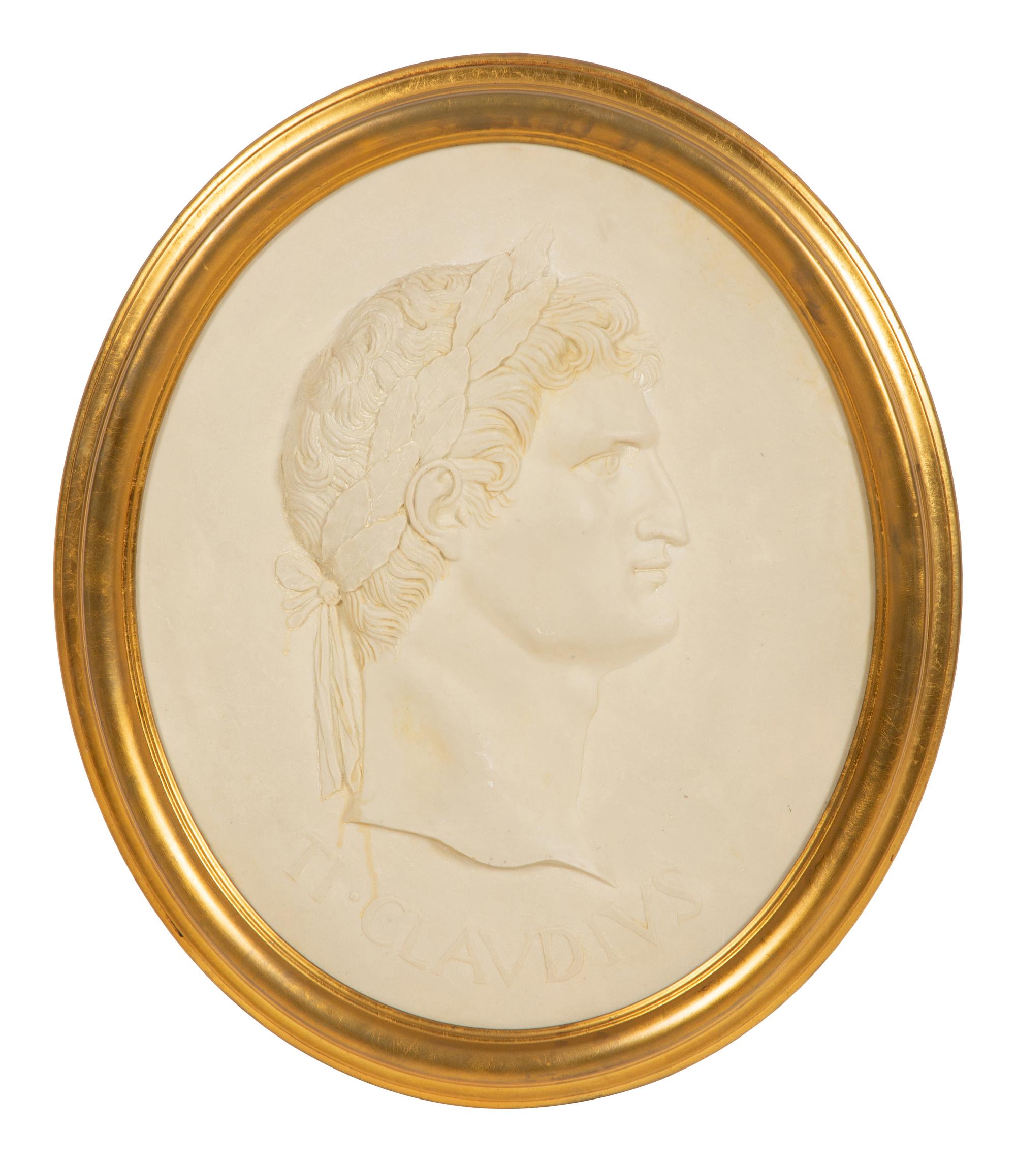 A Pair of Roman Style Composition Relief Plaques in Giltwood Frames
