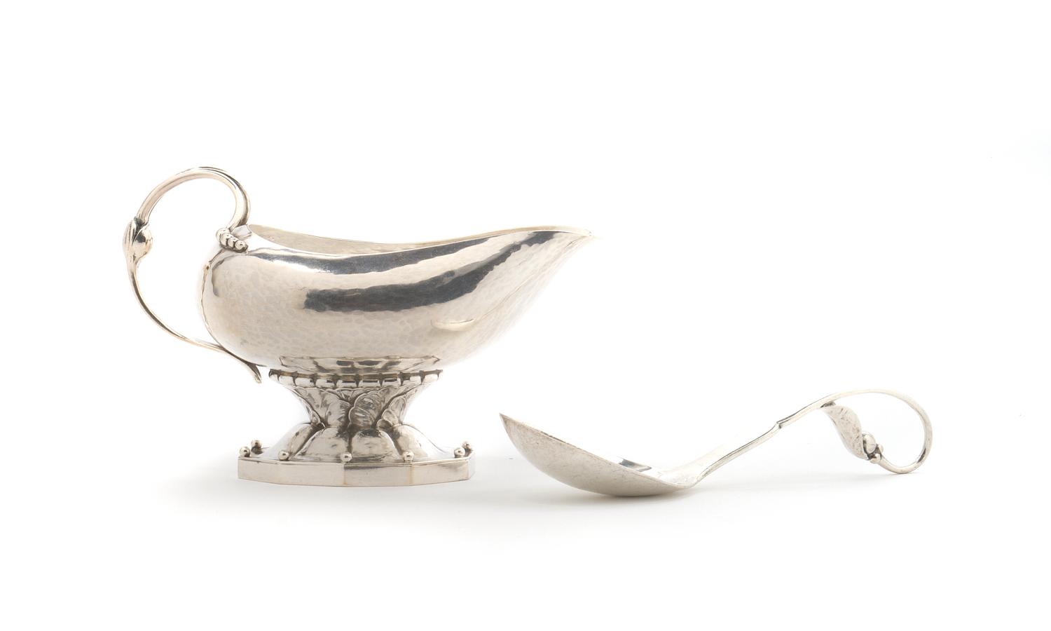 A Danish Sterling Silver Sauce Boat, Georg Jensen, Height 3 1/4 inches.