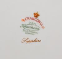 A Set of Fourteen Bavarian Porcelain Chargers
