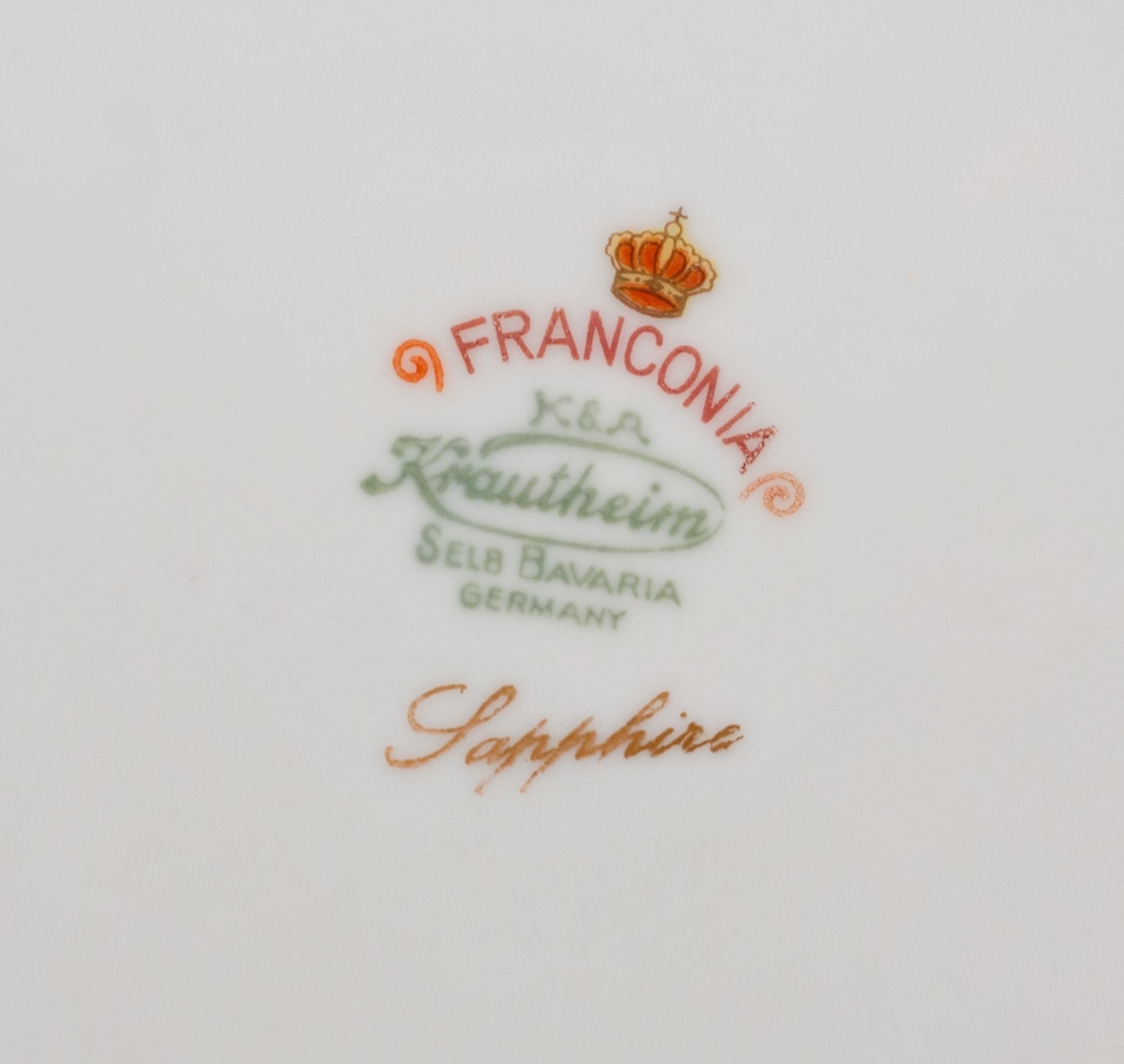 A Set of Fourteen Bavarian Porcelain Chargers