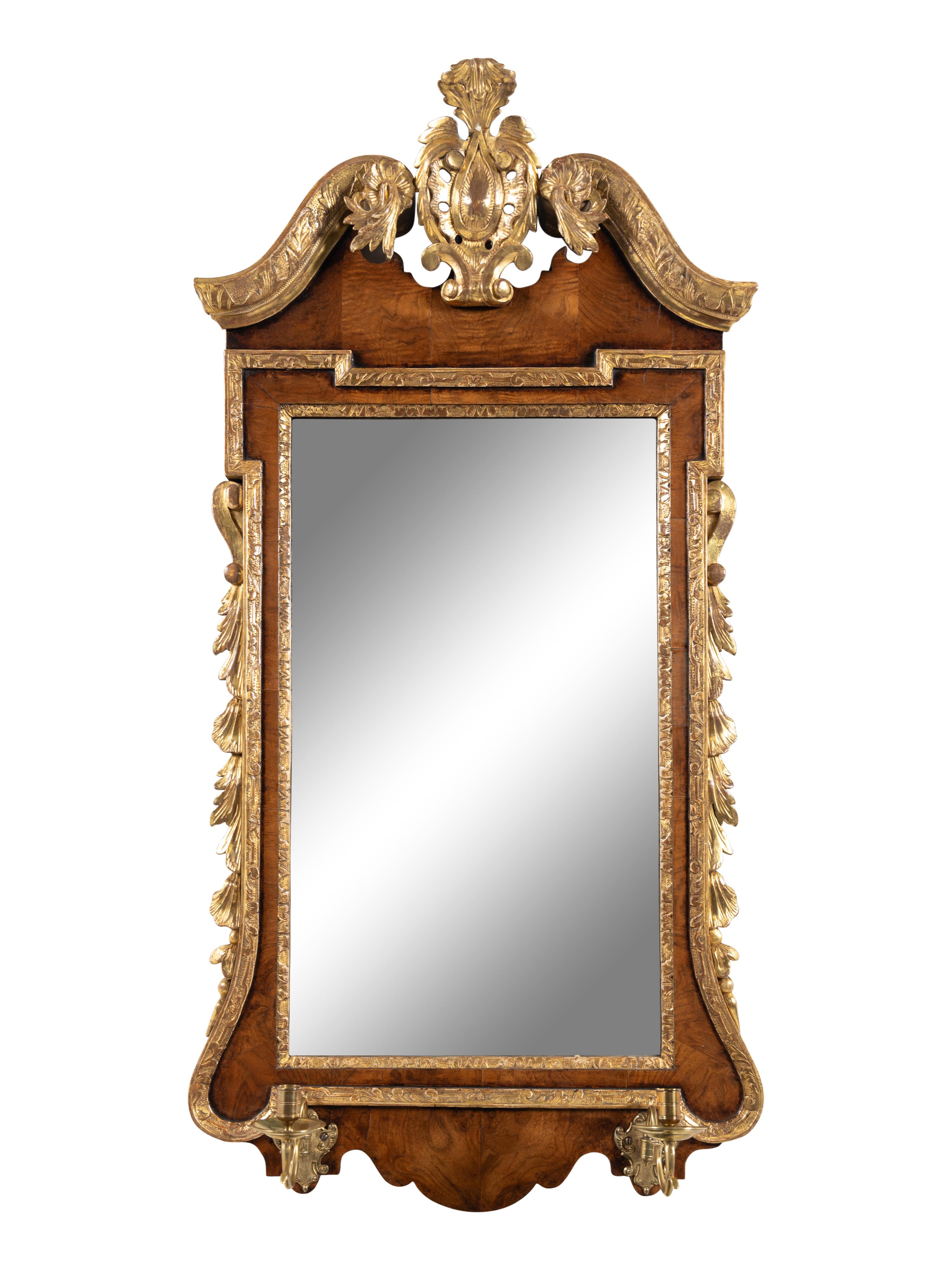 A George II Walnut and Parcel Gilt Girandole Mirror