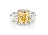 A Platinum, Yellow Gold, Fancy Intense Yellow Diamond and Diamond Ring, 5.20 dwts.