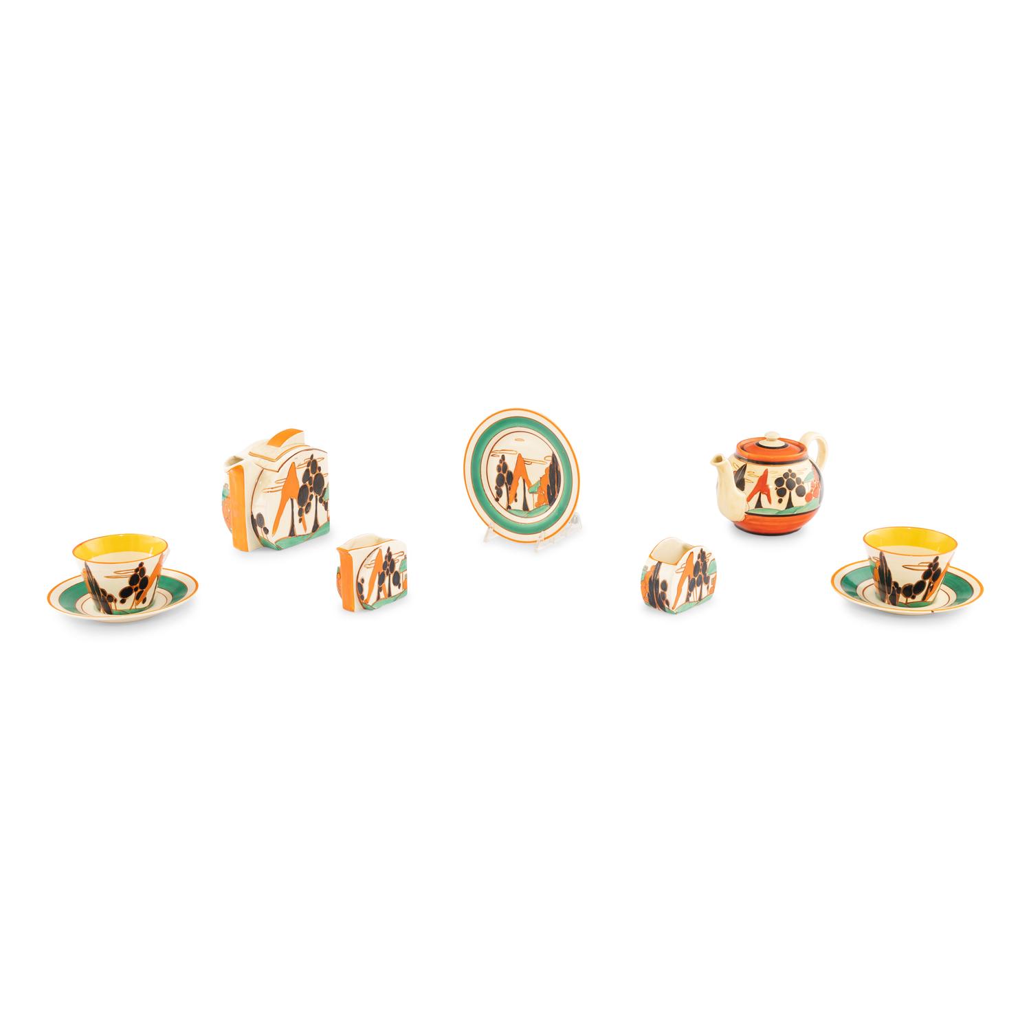 A Group of Seven Clarice Cliff Trees and House (Alpine) Ceramic Table Articles