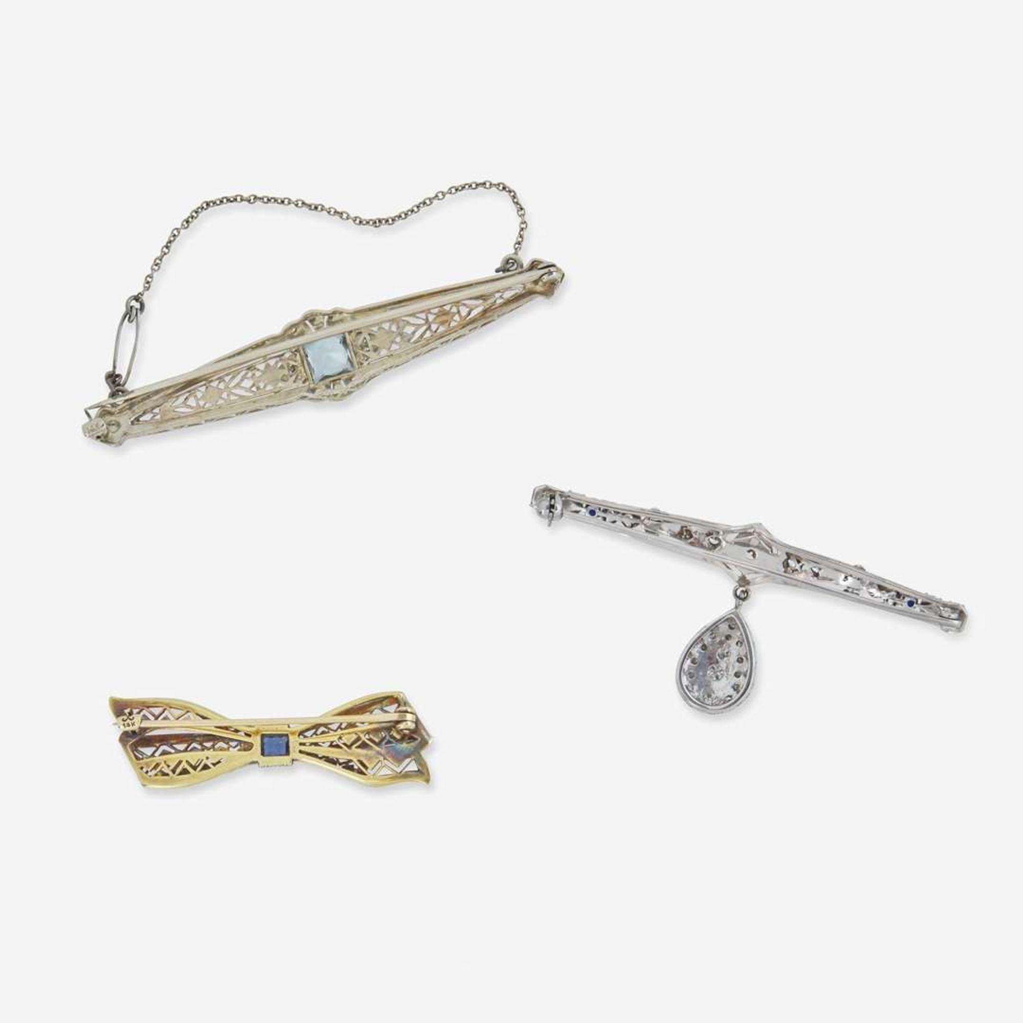 A Collection of Art Deco 14K White Gold Brooches