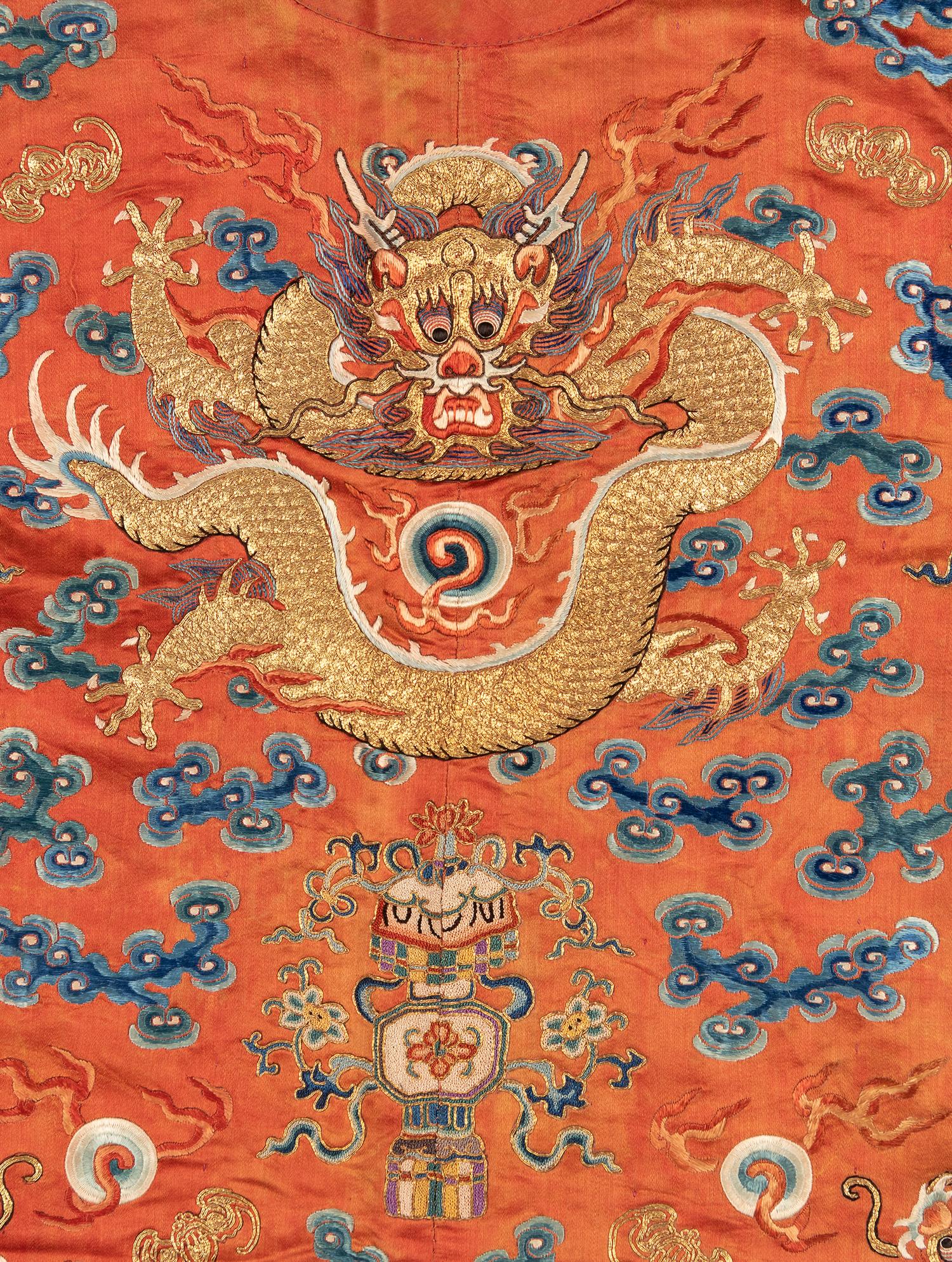 A Apricot Ground Embroidered Silk 'Dragon' Robe, Jifu