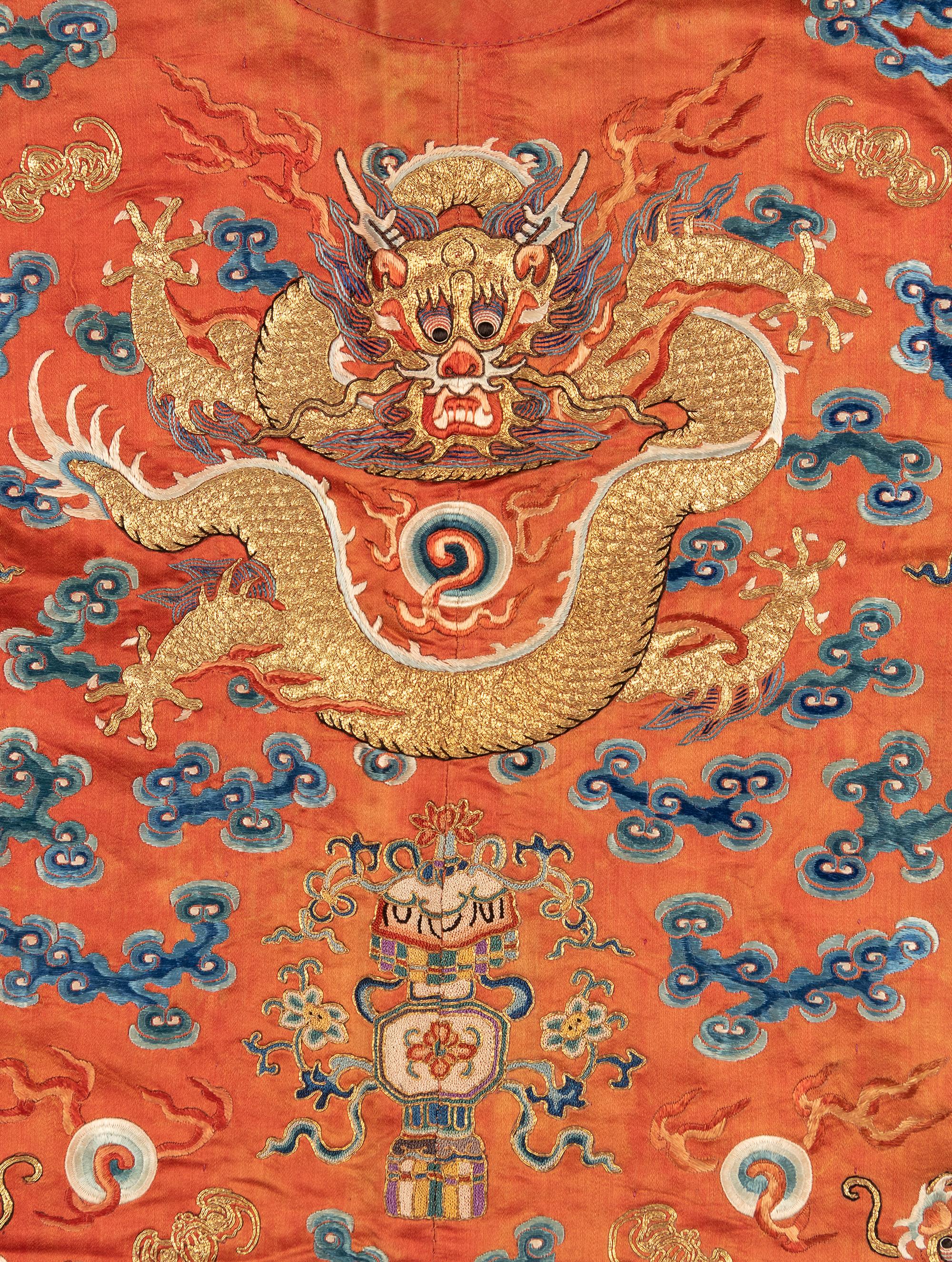 A Apricot Ground Embroidered Silk 'Dragon' Robe, Jifu