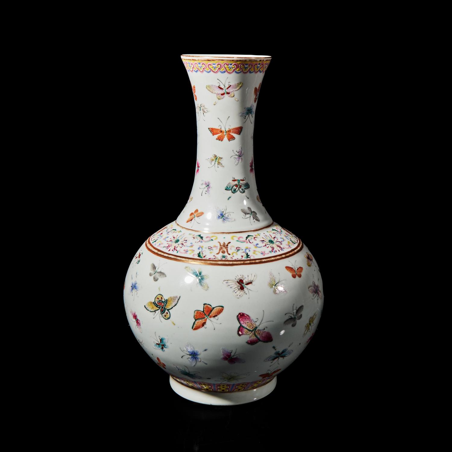 A Chinese Famille Rose "Butterflies" Vase 粉彩百蝶圖賞瓶