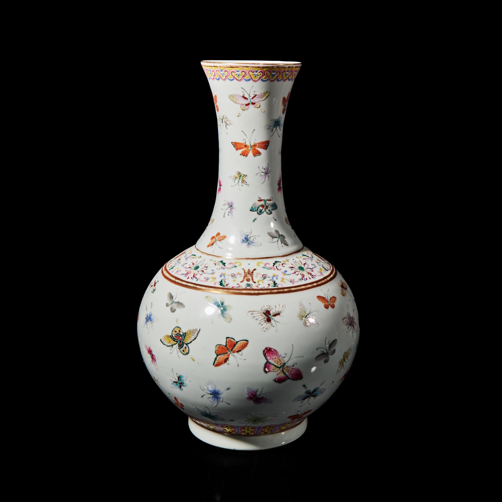 A Chinese Famille Rose "Butterflies" Vase 粉彩百蝶圖賞瓶