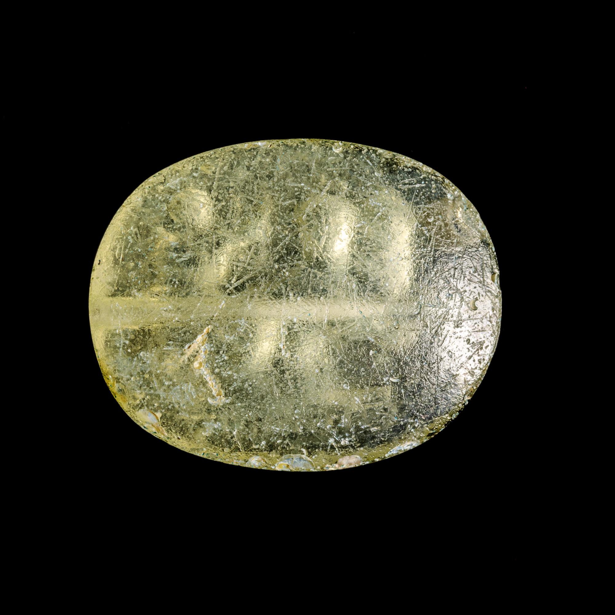 A Greek Glass Scaraboid with the God Dionysos Driving a Biga Chariot Pulled by Panthers
