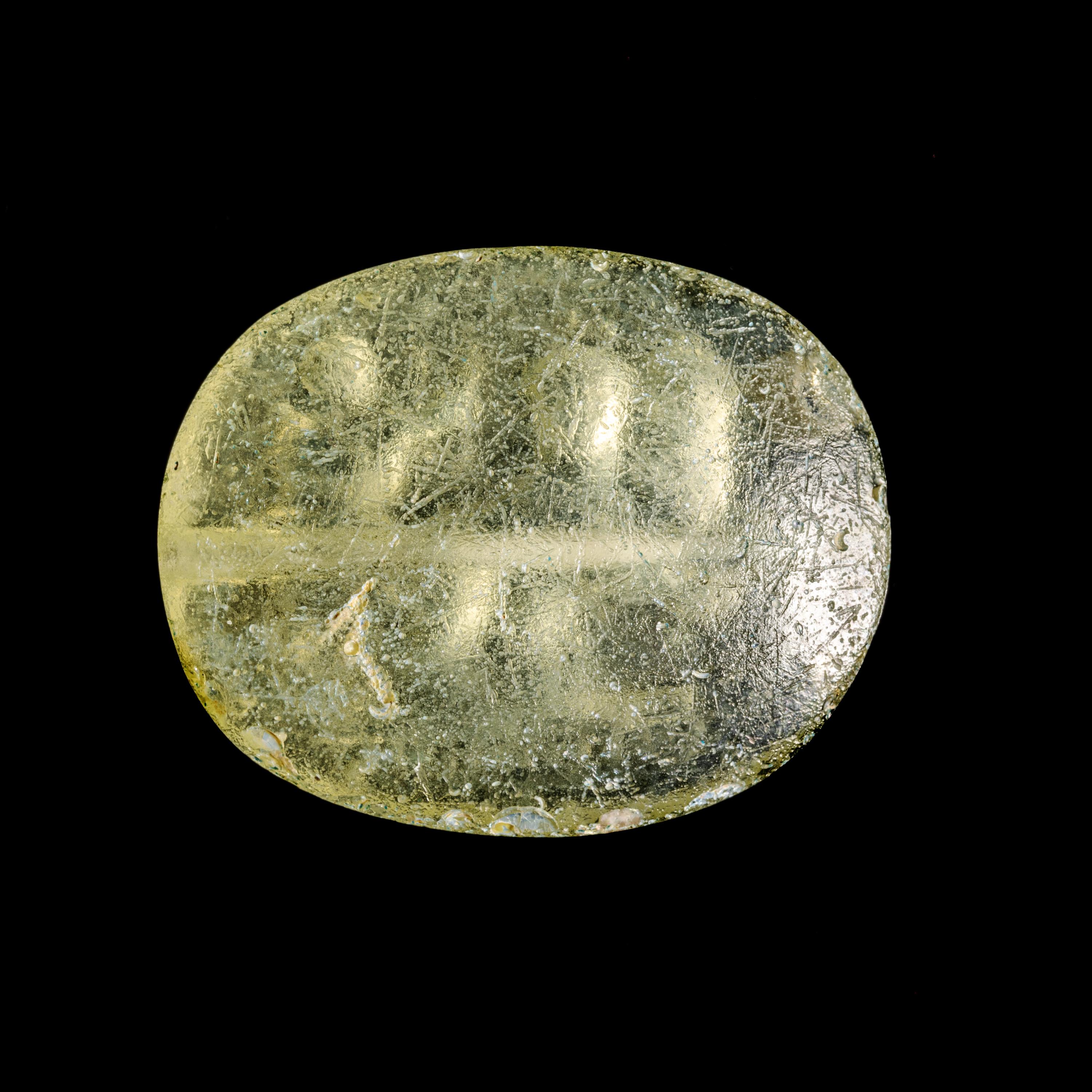 A Greek Glass Scaraboid with the God Dionysos Driving a Biga Chariot Pulled by Panthers