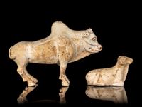A Chinese Painted Pottery Figures of an Ox and a Ram