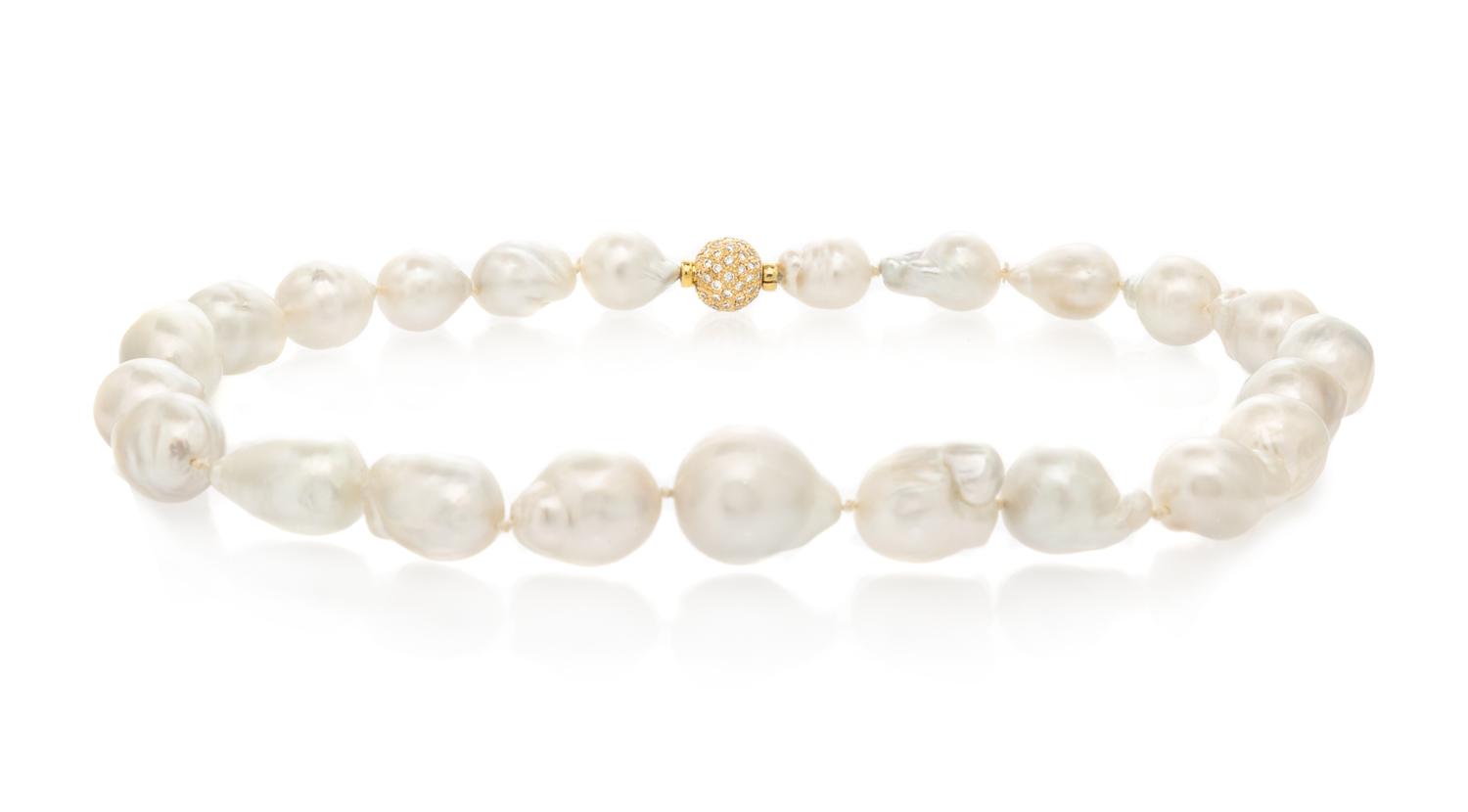 A Yellow Gold and Cultured Baroque Pearl Demi Parure,