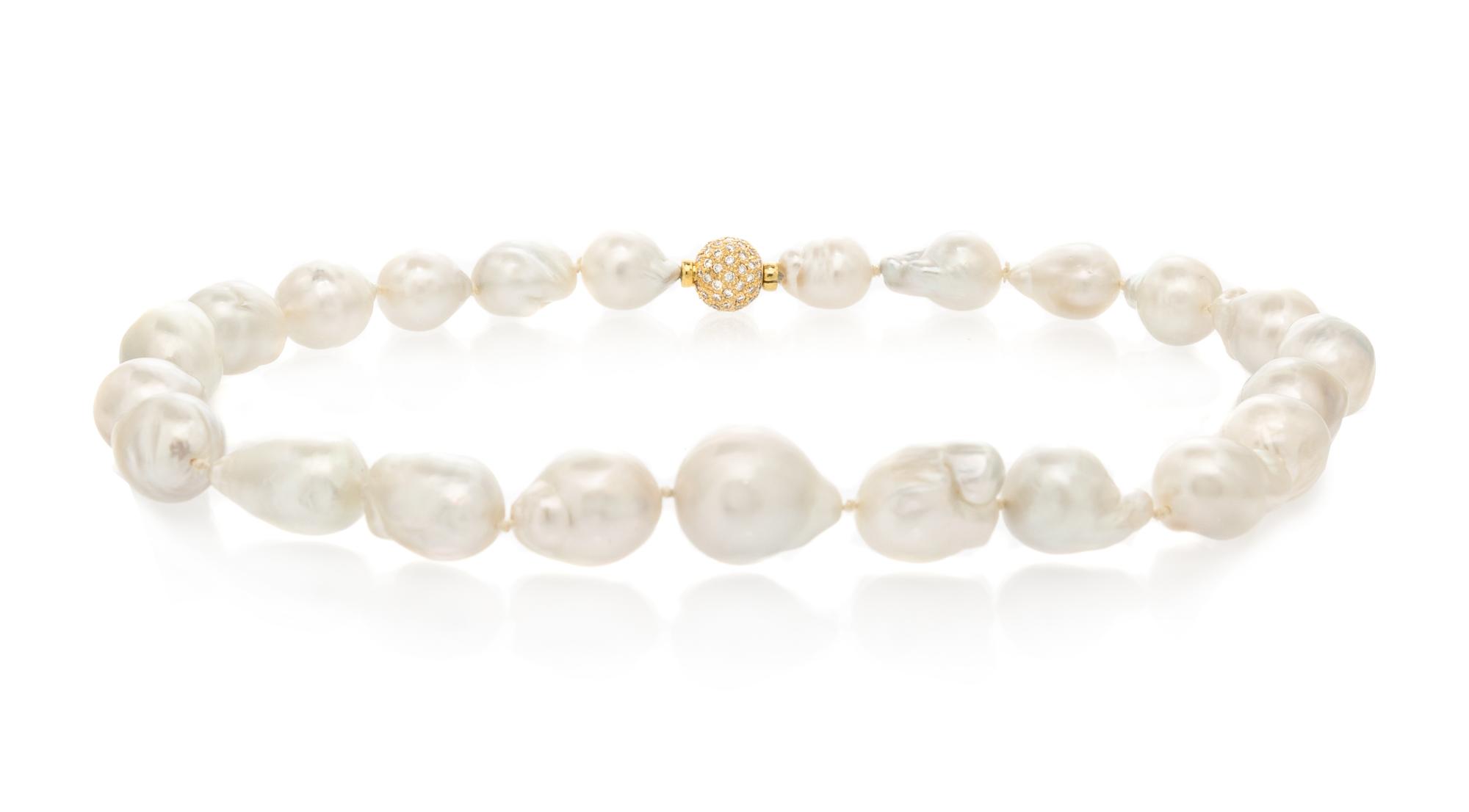 A Yellow Gold and Cultured Baroque Pearl Demi Parure,