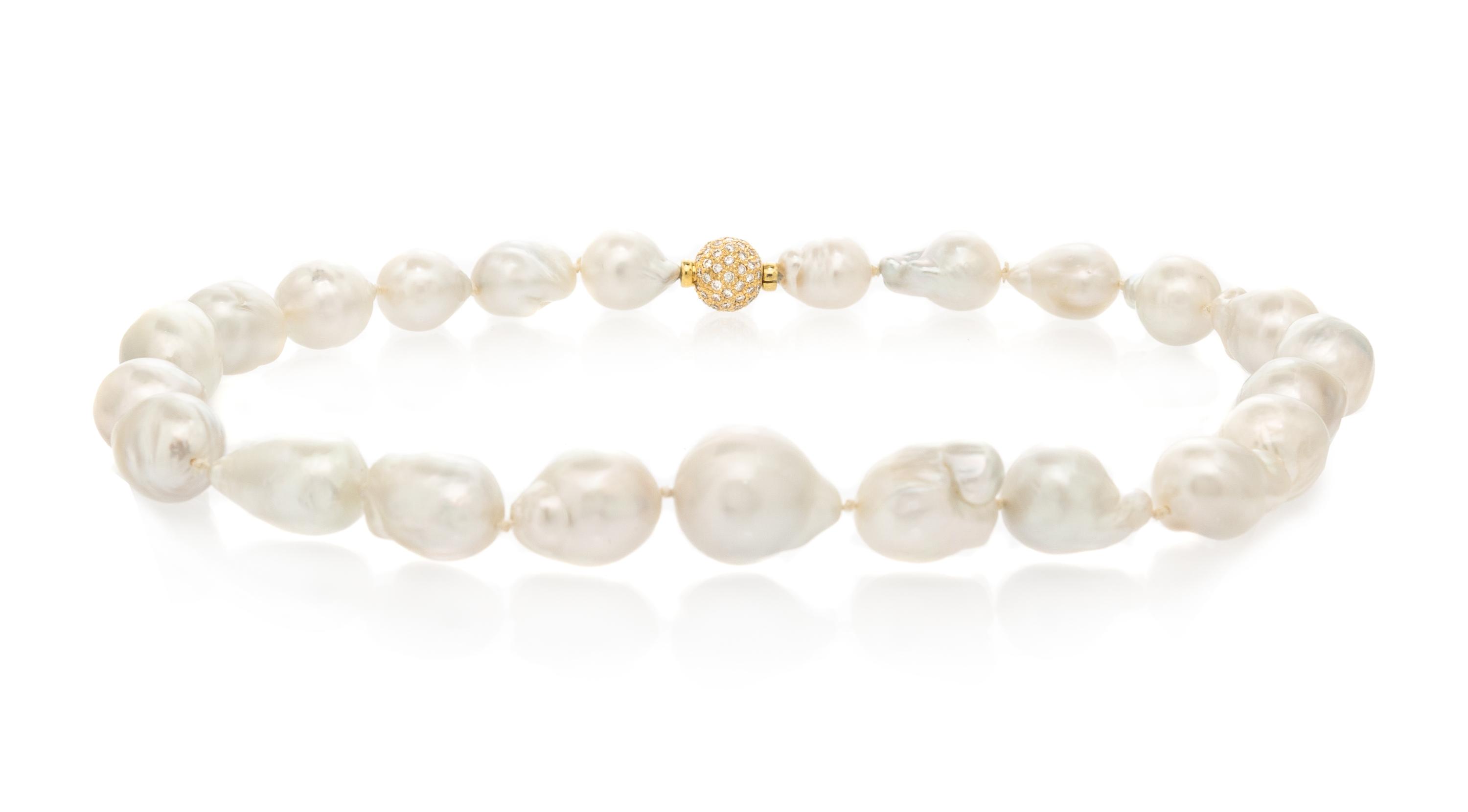 A Yellow Gold and Cultured Baroque Pearl Demi Parure,