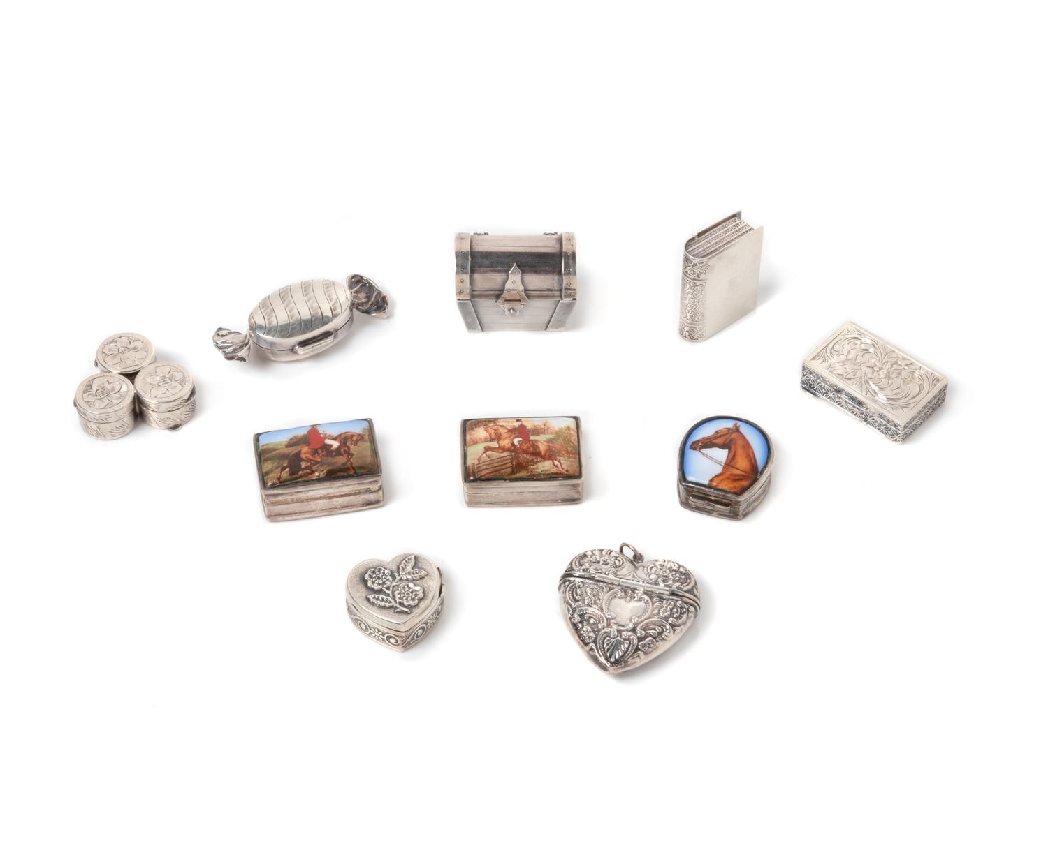 A Group of Ten Silver Pill Boxes