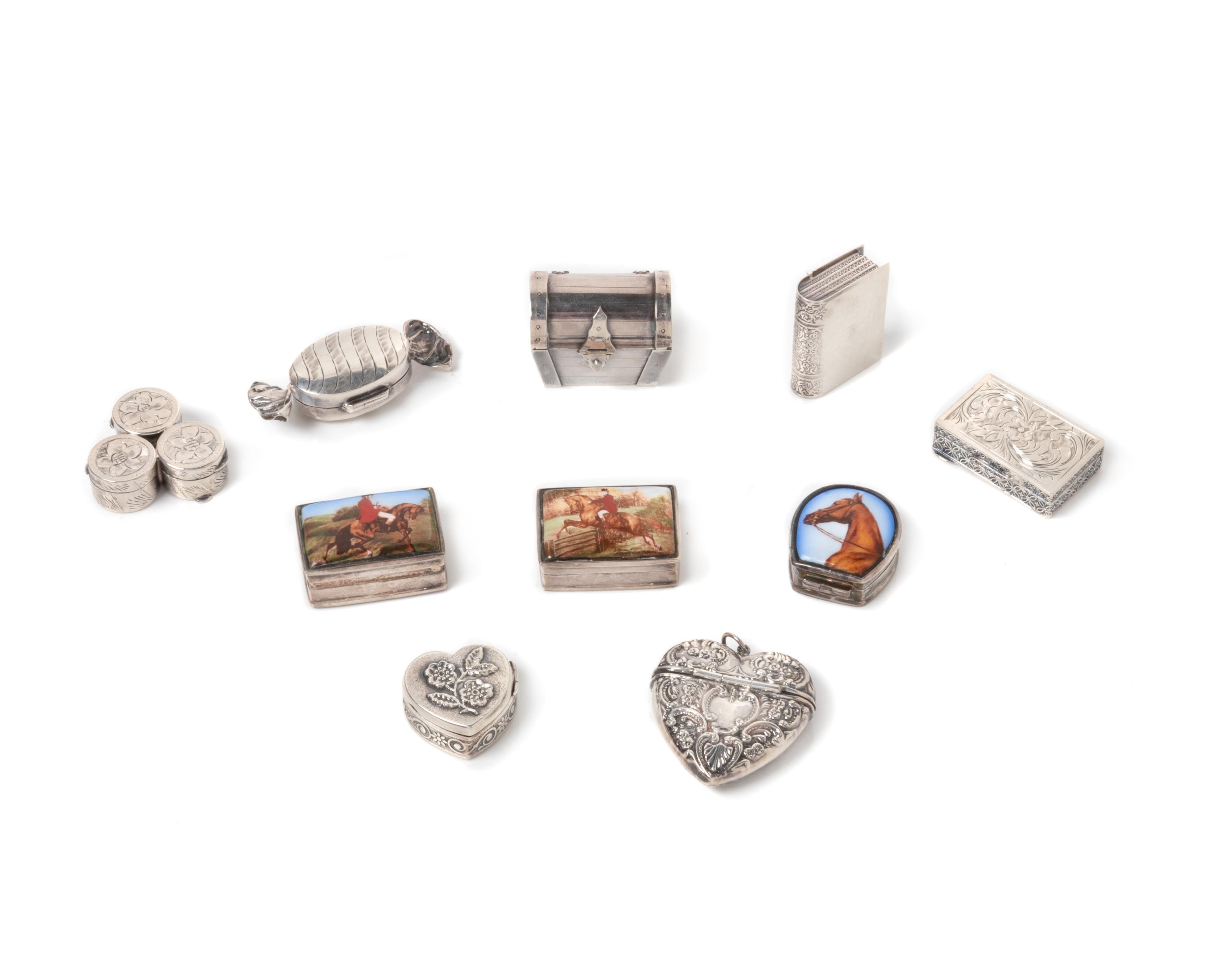 A Group of Ten Silver Pill Boxes