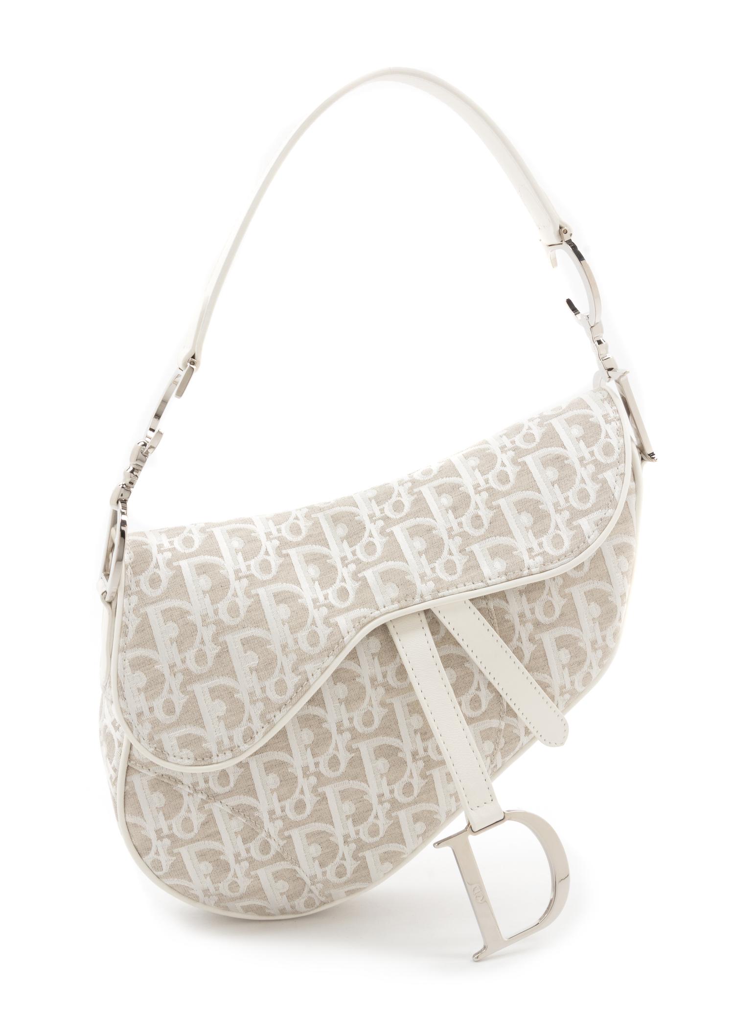 A Christian Dior White and Grey Jacquard Monogram Saddle Handbag, 10" x 8.5" x 2.5".