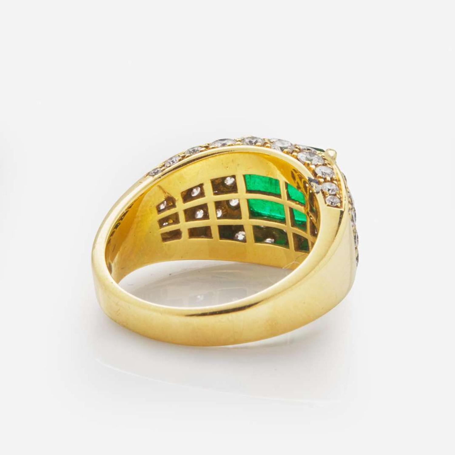 An 18K Yellow Gold, Diamond, and Emerald Ring