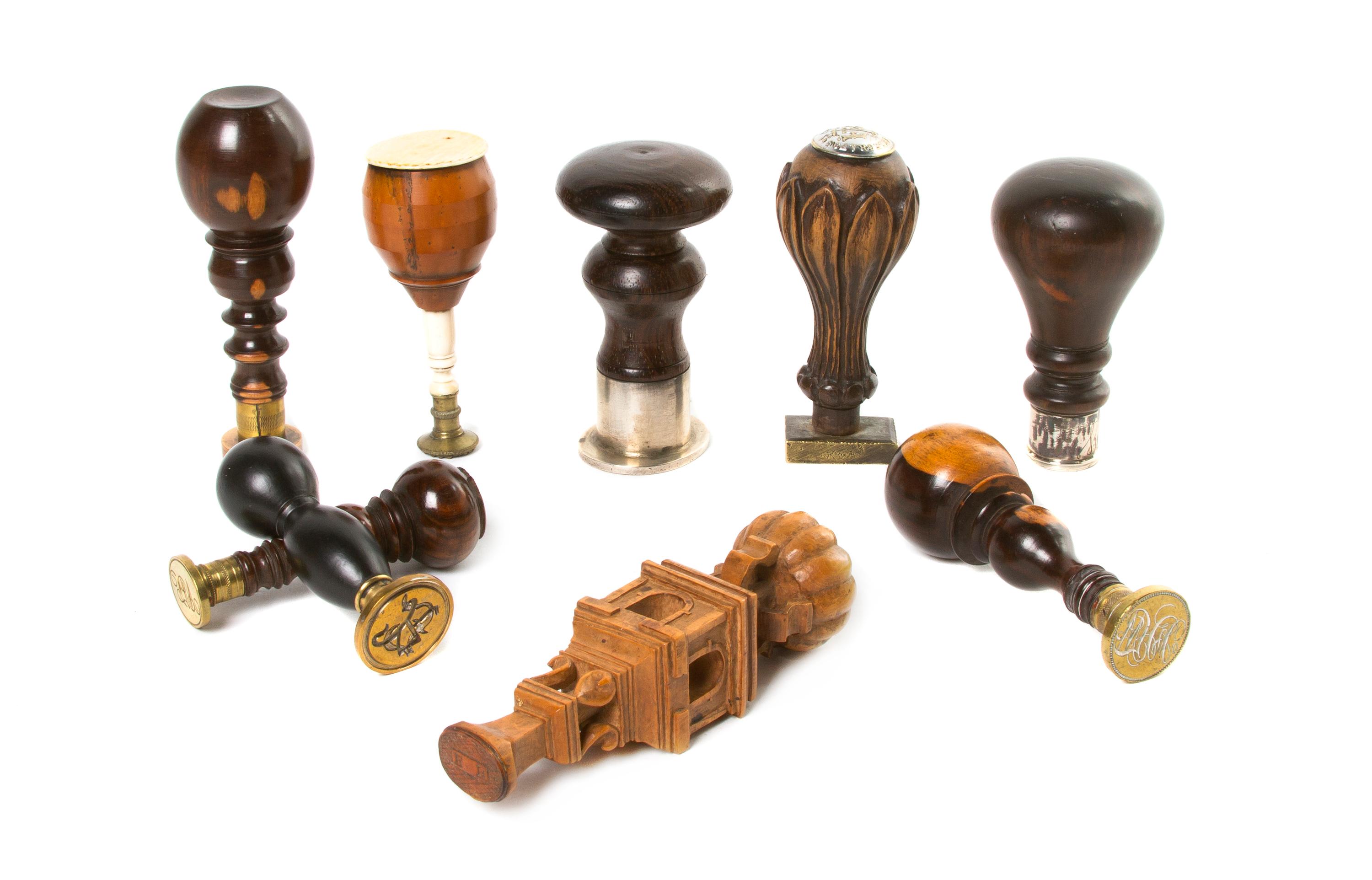 A Collection of Turned Wood Seals, Height of tallest 4 1/4 inches.