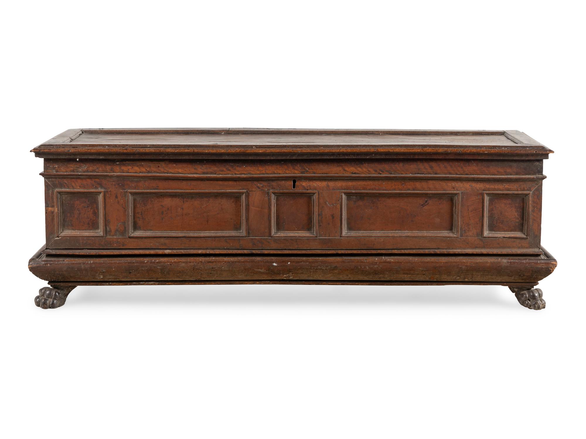 An Italian Carved Walnut Cassone