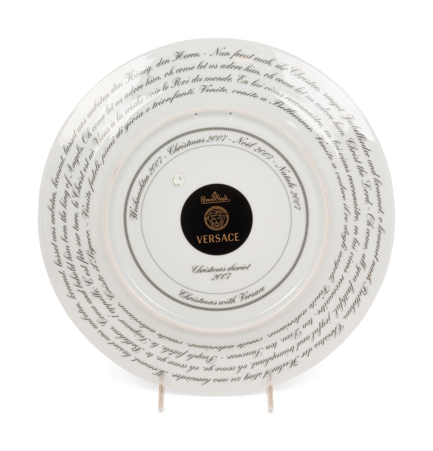 A Group of Versace Christmas Chariot Porcelain Table Articles