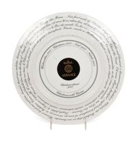A Group of Versace Christmas Chariot Porcelain Table Articles