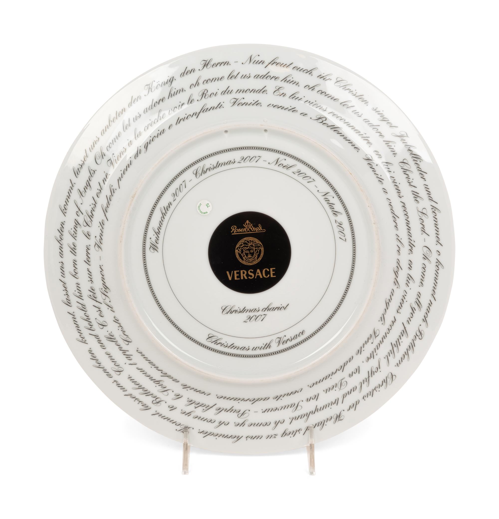 A Group of Versace Christmas Chariot Porcelain Table Articles