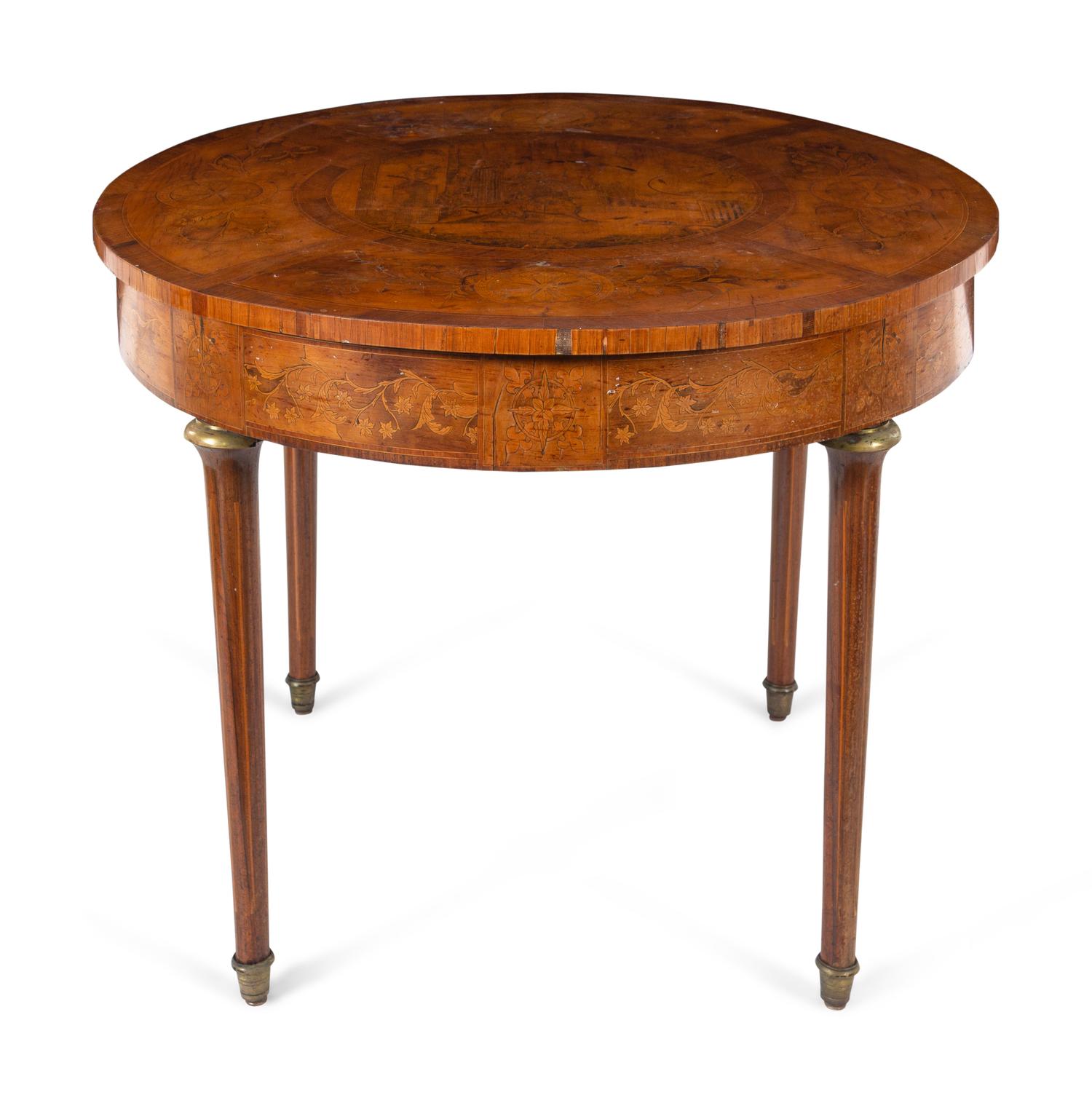 A Continental Marquetry Decorated Center Table