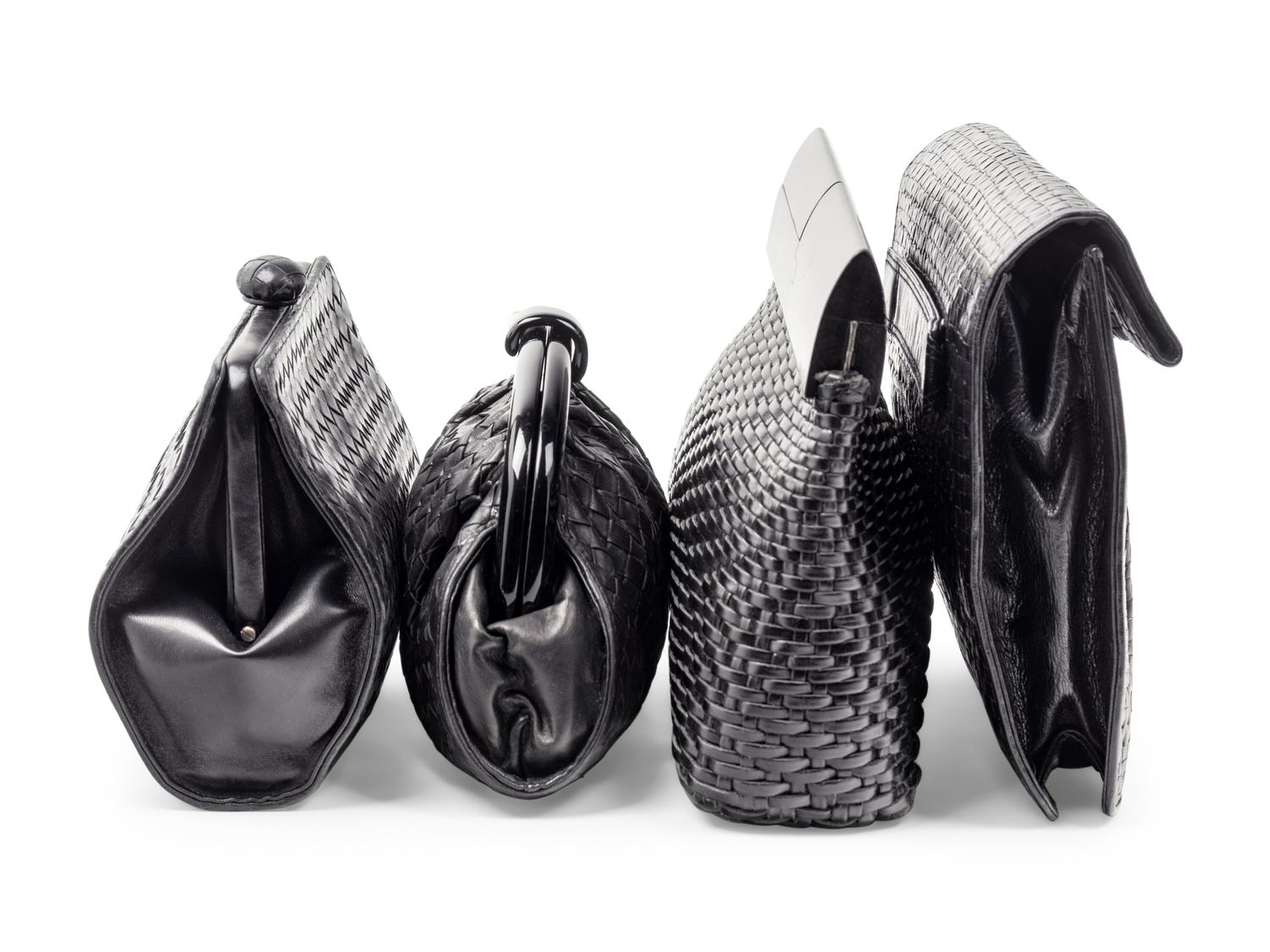 Four Woven Leather Handbags: Two Bottega Veneta, One Fendi, and One De Vecchi, 1980s