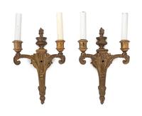 A Set of Six Neoclassical Gilt Bronze Two-Light Sconces