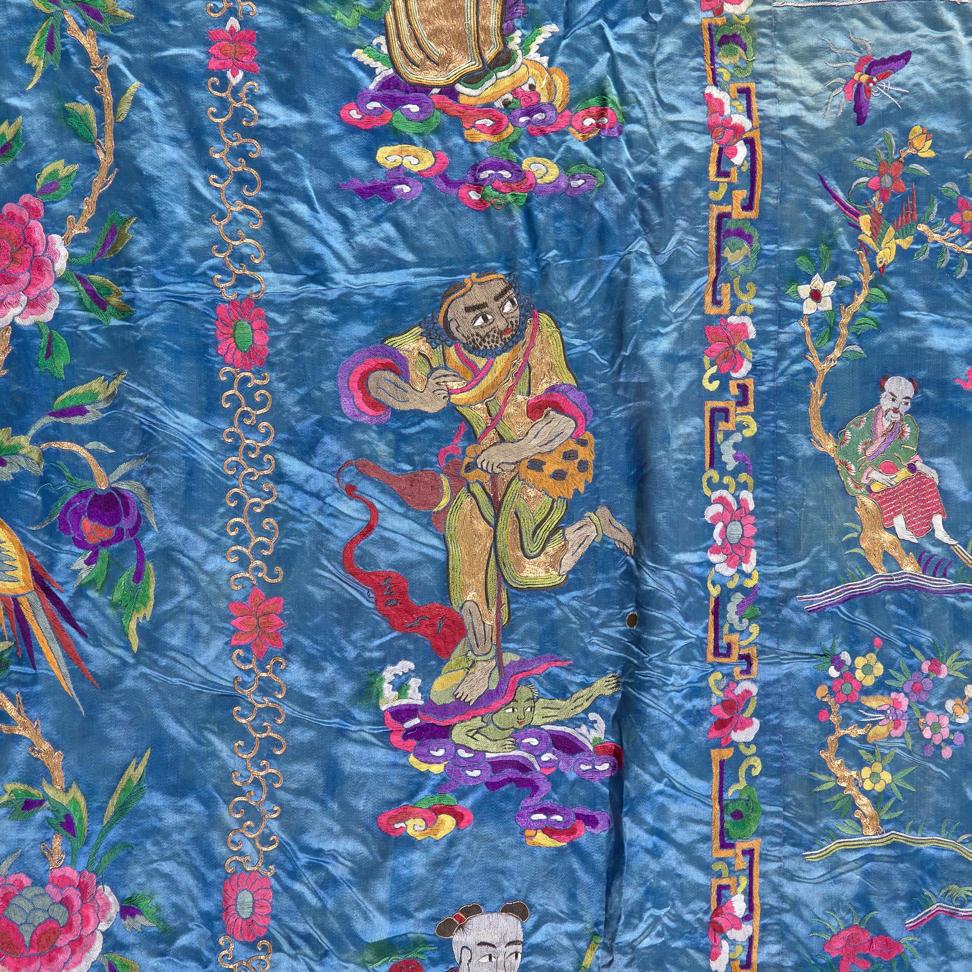 A Massive Chinese Blue Ground Embroidered Silk 'Immortals' Wall Panel, Late 19th/Early 20th Century 清晚期 藍緞地綉群仙祝壽圖挂賬